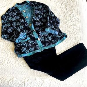 Blue and black reversible Asian style jacket with decorative buttons.